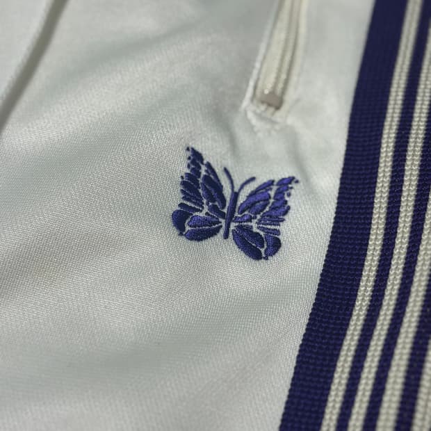 니들스 트랙팬츠