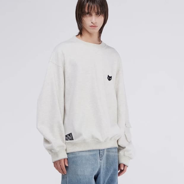 [새상품] 지제로 송지오 슬리브 포켓 팬서 맨투맨 멜란지 크림 M