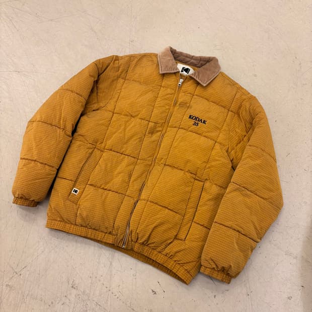 코닥 브라운 빅로고 패딩