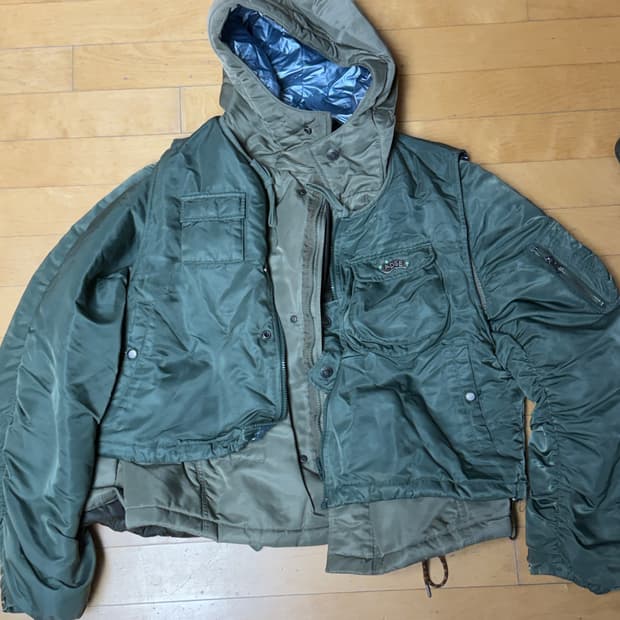 앤더슨벨 헤이든 베스트 패디드 레이어드 자켓 카키