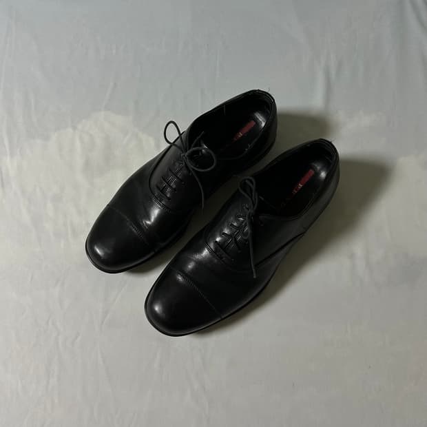 Prada sports cap toe derby shoes