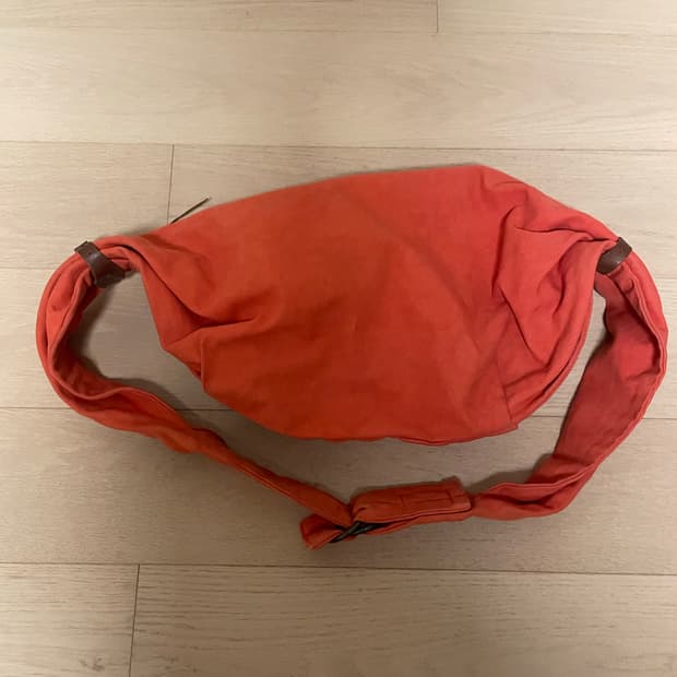 캐피탈 스너프킨백 오렌지