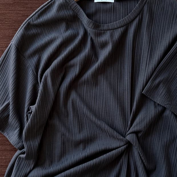 Irregular pattern stretched airy top