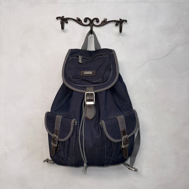 Denim buckled multi pocket backpack