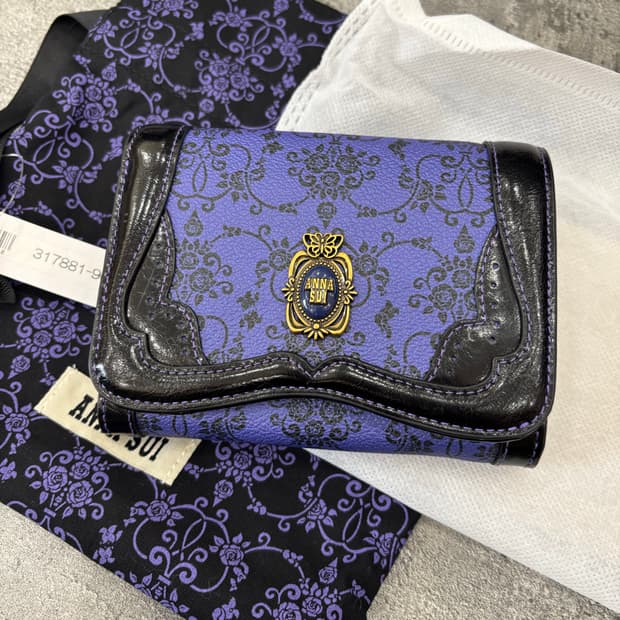 (새상품)안나수이 반지갑 퍼플색상 쇼콜라지갑