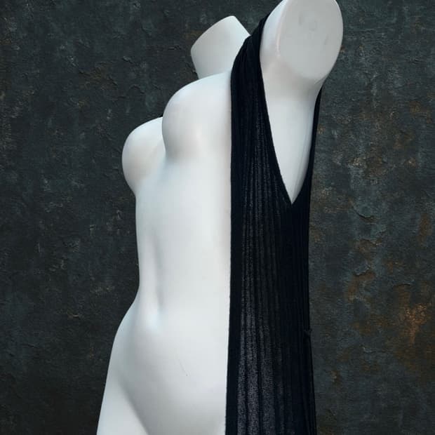 Waist string sleeveless cardigan