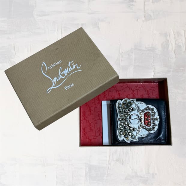 크리스챤 루부탱 카프스킨 지갑