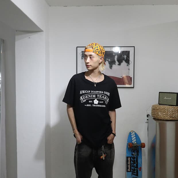 DENIM TEARS Logo Tee