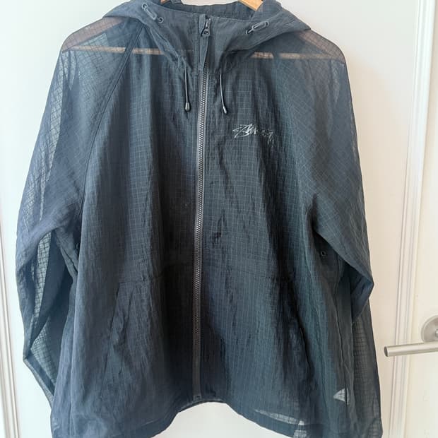 스투시(Stussy) 비치 쉘 트랜스패런트 립스탑 블랙 재킷