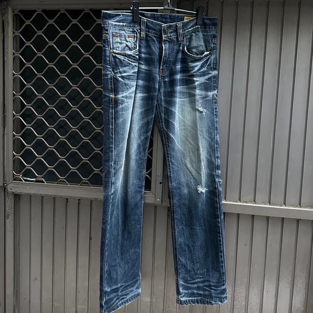 Upset jeans fade lines destroyed denim 