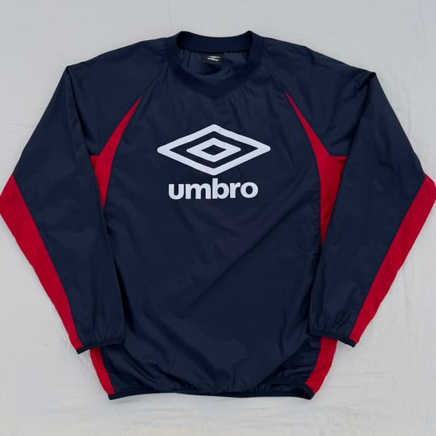 엄브로 웜업 바람막이 피스테