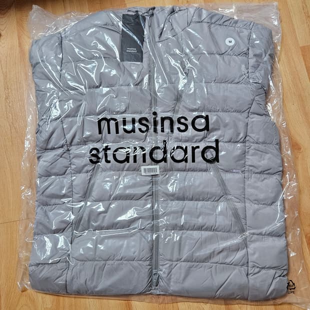 [M] 무신사스탠다드 시티 레저 후디드 라이트 다운 재킷 라이트 그레이