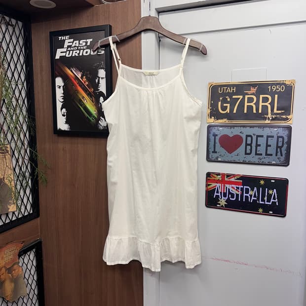 Ivory Sleeveless Frill Dress