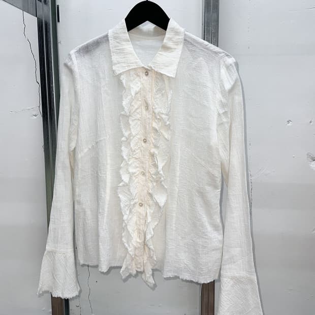 ivory ruffle blouse