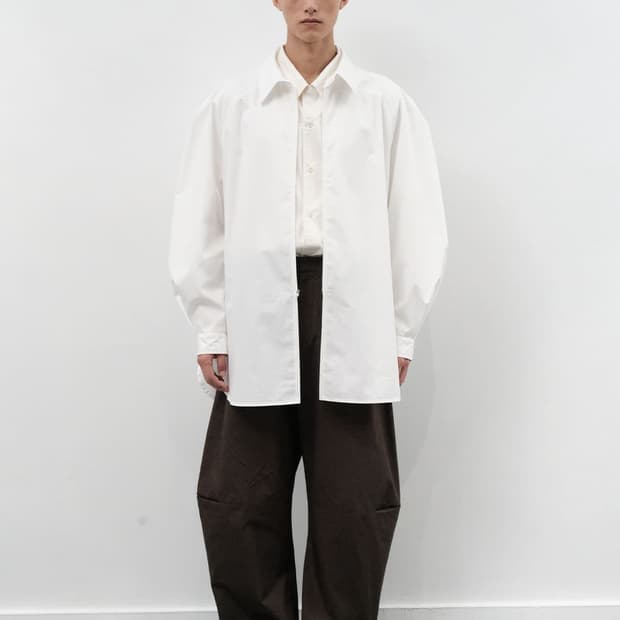 아모멘토 Curved Zip Pants, Brown