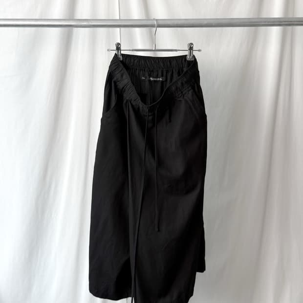 Julius 25AW 오버 랩 팬츠