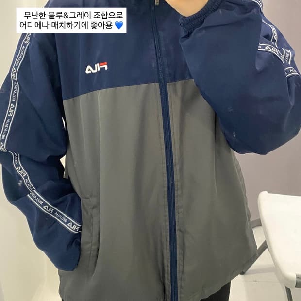 FILA 네이비 그레이 배색 로고 테이프 바람막이