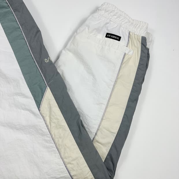 아조바이아조 화이트 배색 우븐 조거팬츠 (M)