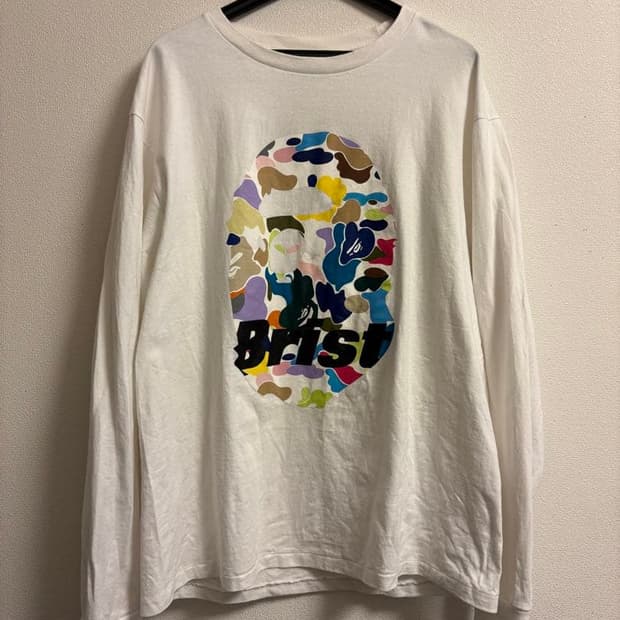 베이프 X F.C.R.B. 에이프 헤드 롱슬리브 티셔츠 화이트