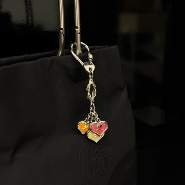 COURREGES heart logo charm