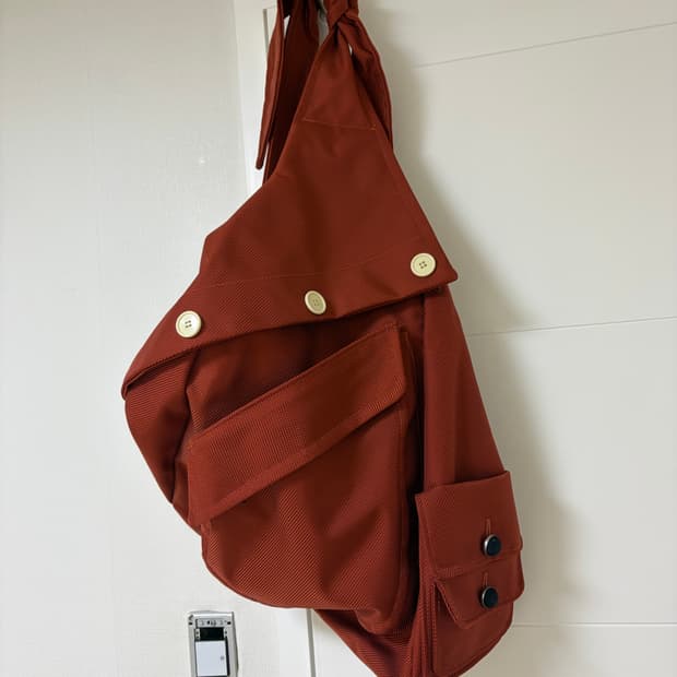 라프시몬스 이스트팩 슬링백