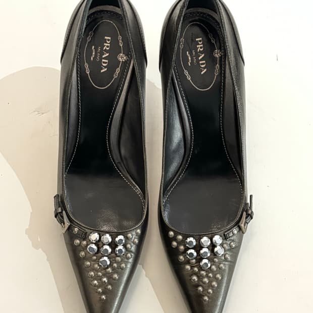 Metallic Buckle Pumps (37½) • PRADA