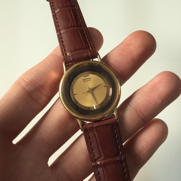 90s seiko gold-black combi quartz