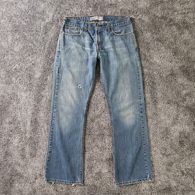 Levi's 527 로우 부츠컷 데님 팬츠