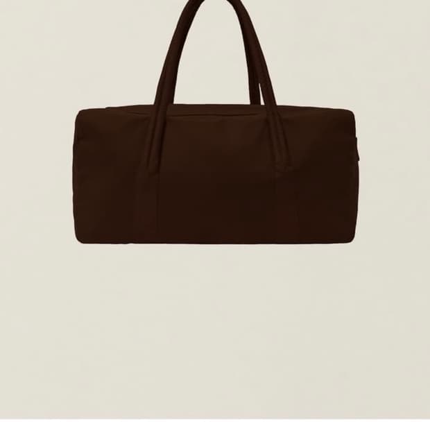 ee 누마레 더플백 브라운 삽니다.