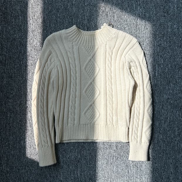 산드로 터틀넥 케이블 니트