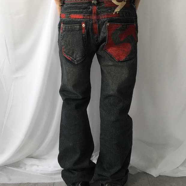 Back point washing denim pants
