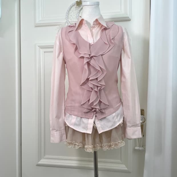 pink ruffle sleeveless blouse