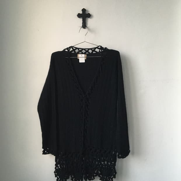 Punching point woolen knit cardigan