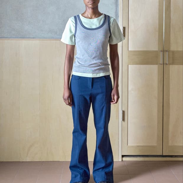 Novayang SIDE SLIT BUTTON FLARE PANTS