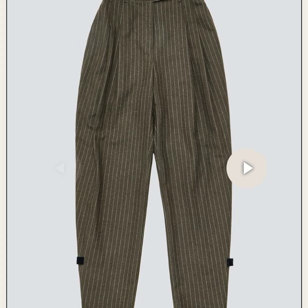 Amomento stripped brown trousers