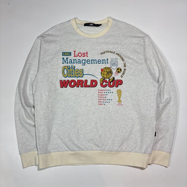 엘엠씨 화이트 그래픽 맨투맨