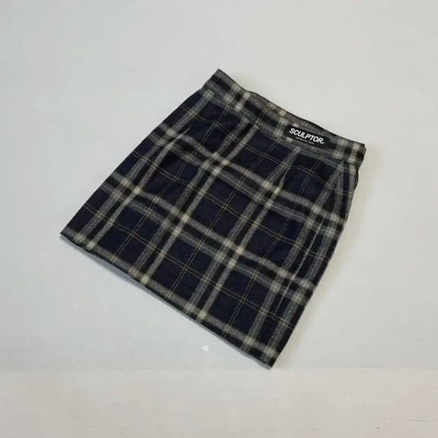 스컬프터 울 체크 치마