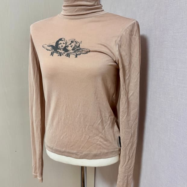 러닝하이 베이지 터틀넥 탑