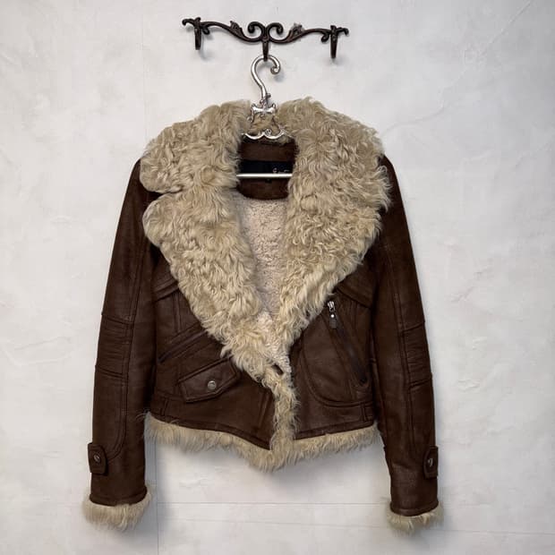 Dark brown lamb fur buckle mustang