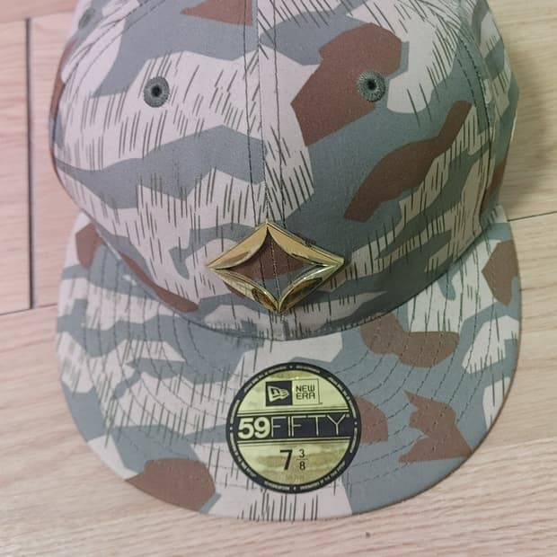 뉴에라 헬리녹스 카모 스냅백 58.7cm