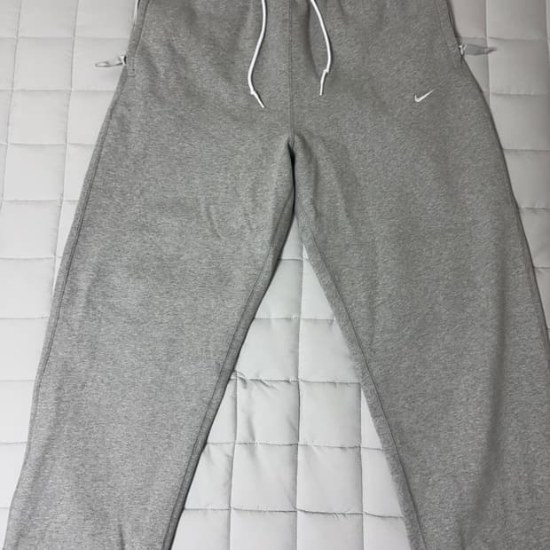 스포츠웨어 스우시 오픈 헴 플리스 팬츠