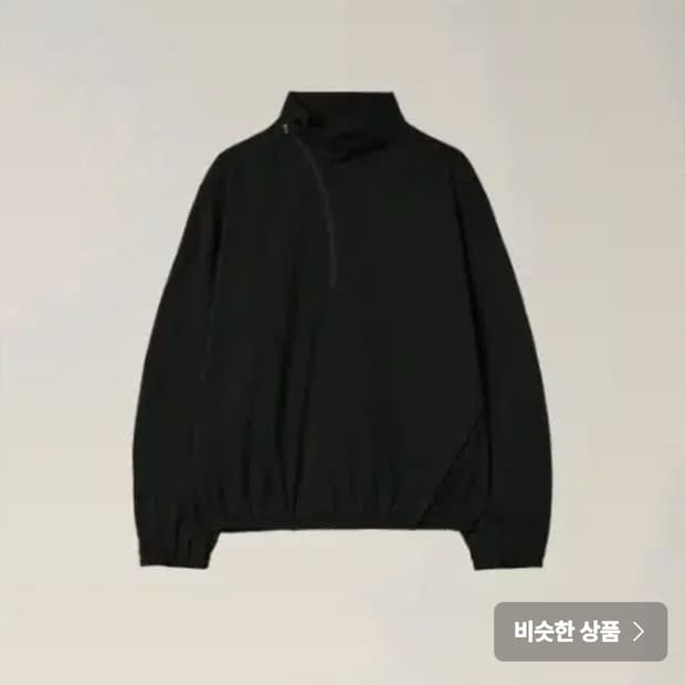 이이 커브드 하프 집업