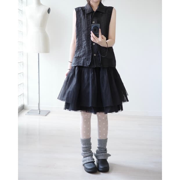 Ink-black lace-panel buttoned vest