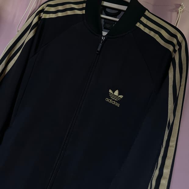 아디다스져지 아디다스 블랙 골드 파이어버드 슈퍼스타 검골 집업 트랙탑