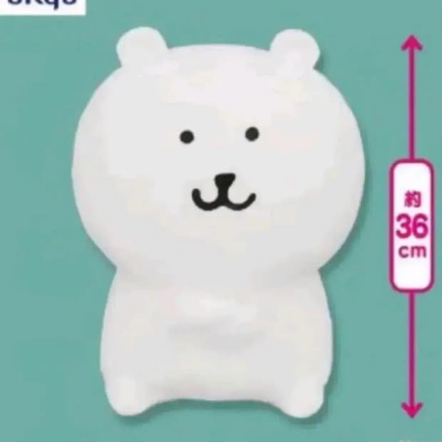  앉은 팔짱낀 대형 농담곰 인형 