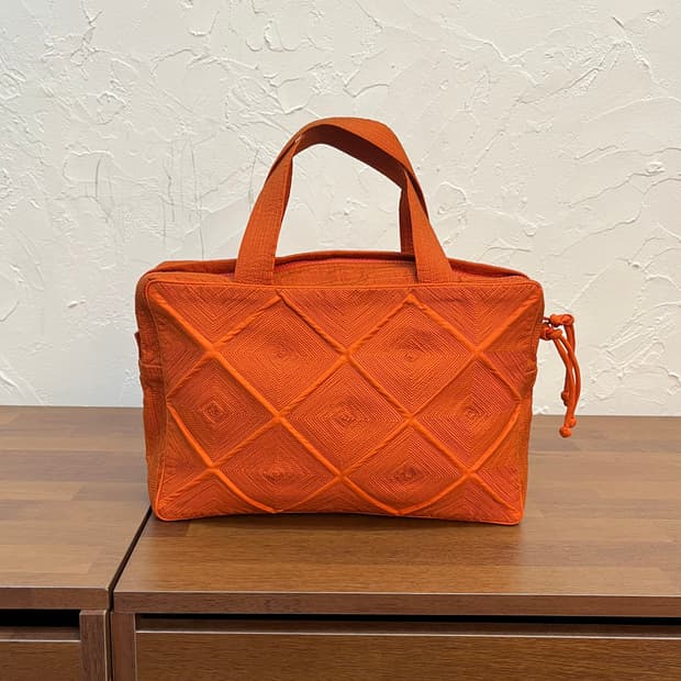 이세이 미야케 타마샤 스티치 핸드백