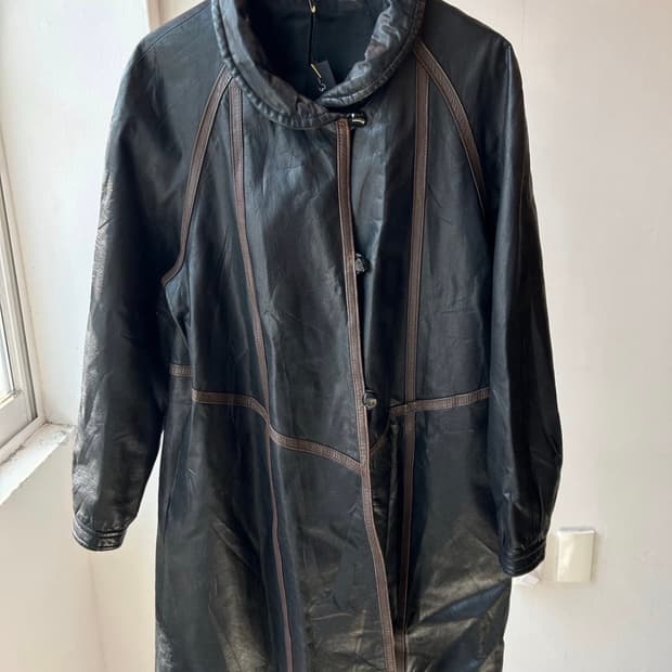 PARTINA round collar midi leather coat