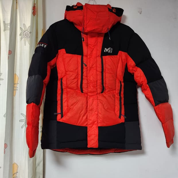 밀레 여성 오리털 오렌지/블랙 패딩 95