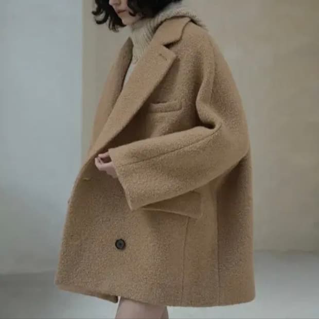 노미나떼 노엘 부클하프코트 