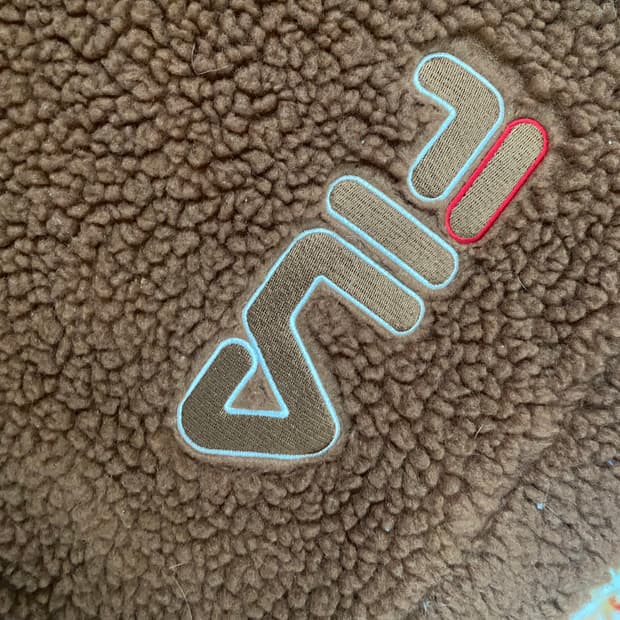 휠라 뽀글이 토트백 브라운 가방